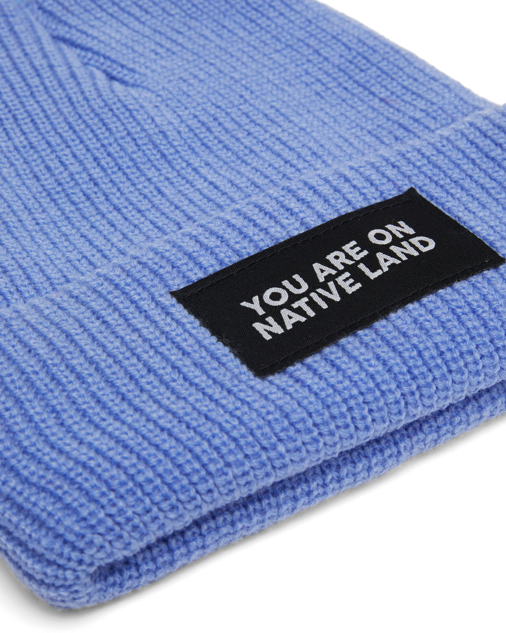 'YOU ARE ON NATIVE LAND' RIBBED BEANIE